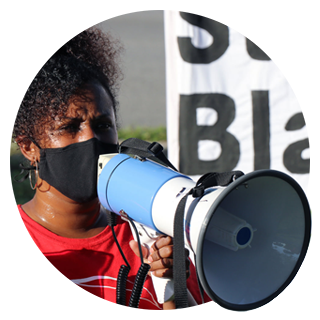 PSL member on bullhorn